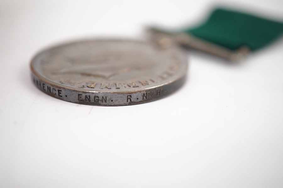 A First World War medal trio and Naval Reserve Long Service medal awarded to R.E.A. Lawrence ENGN RNR. Condition - fair.